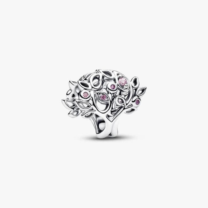 Silver tree-shaped charm on a light background