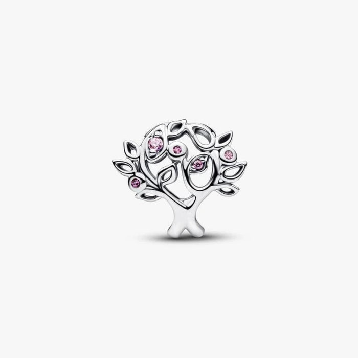 Silver tree-shaped charm on a light background