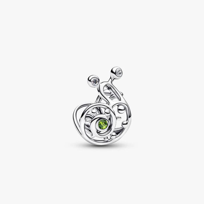  A silver and green enamel charm shaped like a snail, showcasing intricate detailing and vibrant colors.