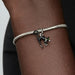 Pandora Black Cat dangle charm featuring an intricately detailed black cat with a polished finish, designed for PANDORA Moments bracelets and necklaces.