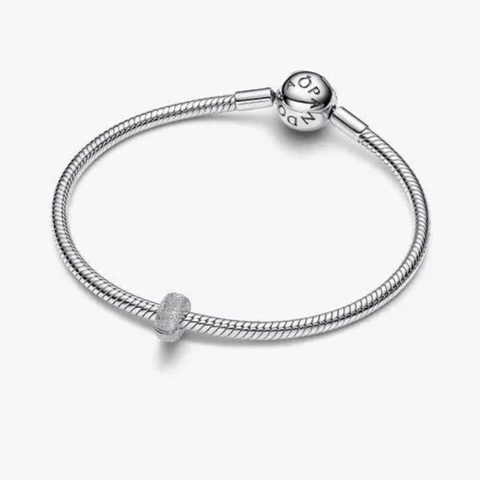 Textured Mini Clip Charm featuring a compact clip design