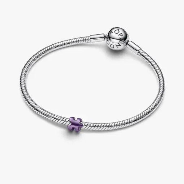 Purple Puzzle Piece Mini Charm featuring a vibrant purple puzzle piece design