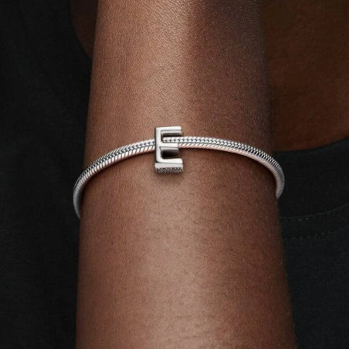 This Pandora Letter Charm - “E” adds a personal touch to your jewelry collection. 