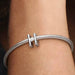 This Pandora Letter Charm - “H” brings a meaningful and personal element to your jewelry collection.