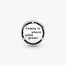Back of the Pandora Family Tree Charm in sterling silver engraved with “Family is where love grows.”