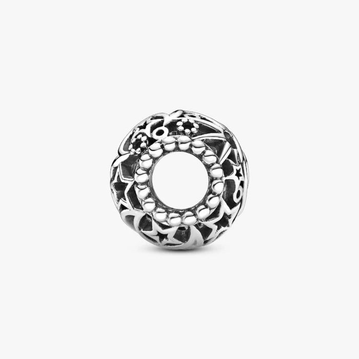 A sleek silver ring adorned with a striking black and white pattern, highlighting its contemporary style.
