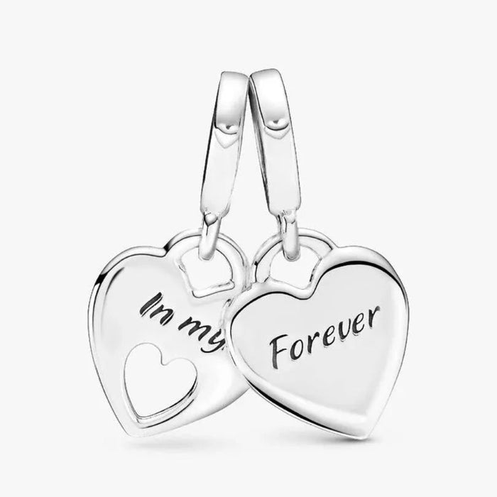 Pandora Double Heart Split Dangle Charm featuring a symbolic double-heart design representing love and connection.