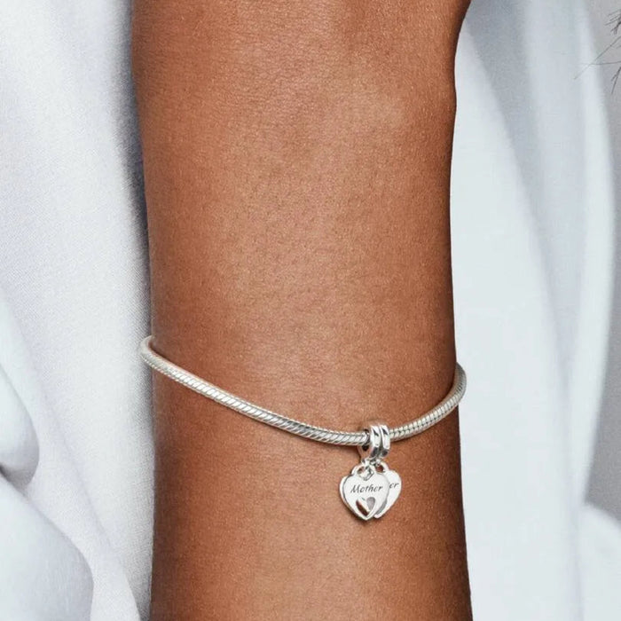  Pandora Double Heart Split Dangle Charm featuring a symbolic double-heart design representing love and connection.