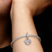 Heart & Mom dangle charm with polished heart design for bracelets or necklaces.