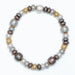 Pearlized stretch bracelet featuring lustrous gray beads with polished gold-tone accent beads on a comfortable stretch band for everyday elegance.