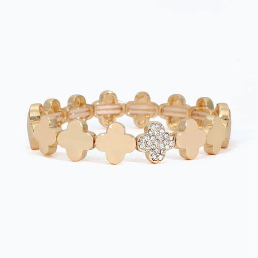 Periwinkle linked gold clover bracelet featuring sparkling pave accents and an elegant repeating design.