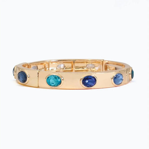 Periwinkle gold bracelet featuring sparkling royal blue and aqua crystals in an elegant colorful design.