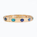 Periwinkle gold bracelet featuring sparkling royal blue and aqua crystals in an elegant colorful design.
