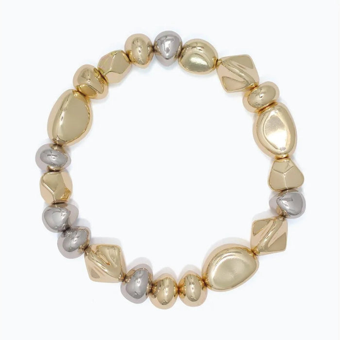 Periwinkle bracelet featuring sculpted mixed metal beads in a textured design.