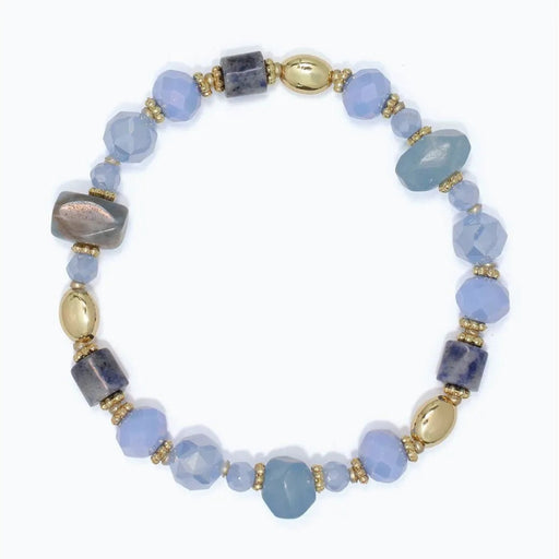 Periwinkle bracelet featuring faceted blue quartz and sodalite beads in rich blue tones.