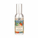 Silver spray bottle labeled "L'Orange Scented Room Spray" by Michel Design Works, with illustrations of oranges and leaves, conveying a fresh scent.