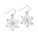 Periwinkle silver snowflake earrings featuring sparkling crystal accents, perfect for elegant winter and holiday looks.