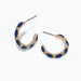 Periwinkle gold hoop earrings with faceted navy accents and a polished, elegant design.