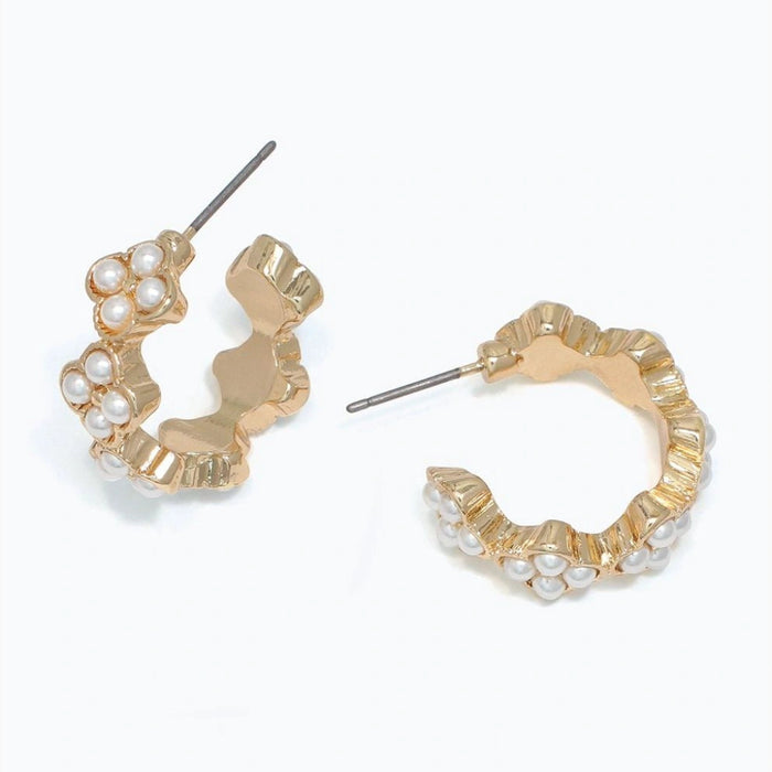 Their lightweight design makes them comfortable for all-day wear, while the timeless combination of gold and pearls complements any outfit.