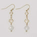 This Periwinkle Gold Clovers With White Crystal Earrings feature brilliant white crystal accents that catch the light beautifully