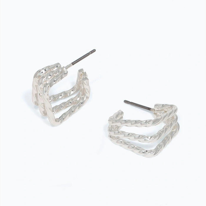  These earrings offer a contemporary take on a classic silhouette. 