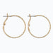 Periwinkle delicately textured gold hoop earrings with a classic silhouette and refined finish