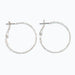 Periwinkle delicately textured silver hoop earrings with a classic silhouette and refined finish