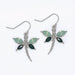 Periwinkle mint green dragonfly earrings featuring a delicate nature-inspired design