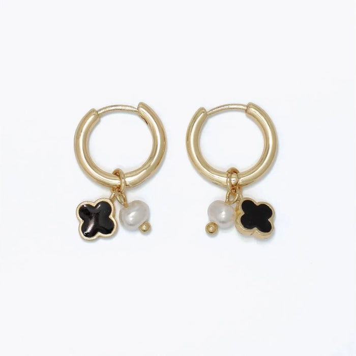Periwinkle black clover and pearl huggie earrings featuring elegant clover accents and delicate pearl details