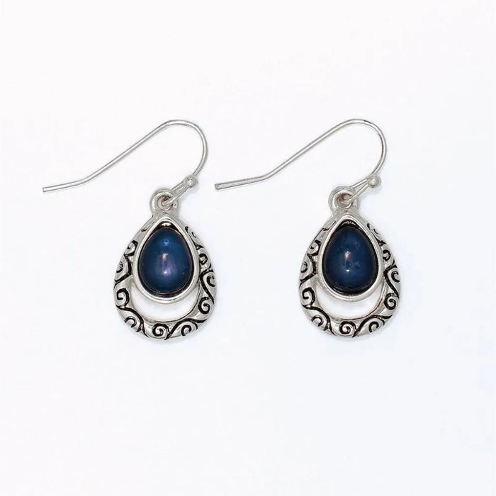 Periwinkle silver filigree drop earrings with navy inlay accents and an intricate openwork design