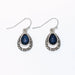 Periwinkle silver filigree drop earrings with navy inlay accents and an intricate openwork design