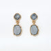 Periwinkle dusty blue drop earrings featuring delicate crystal accents in an elegant design