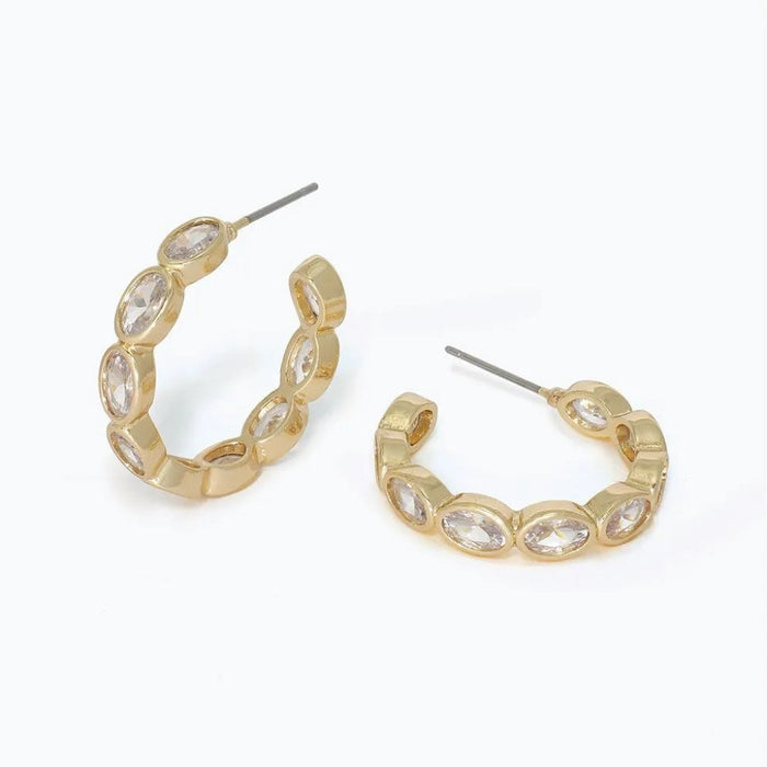 Gold bubble hoop earrings featuring clear CZ accents and a polished finish