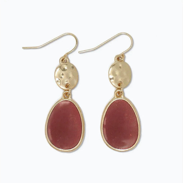 Hammered gold and wine oval earrings with a textured elegant design