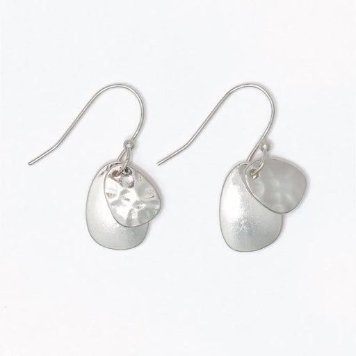 Hammered and polished silver layered earrings with a modern textured design