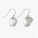 Hammered and polished silver layered earrings with a modern textured design