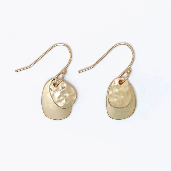 Hammered and polished gold layered earrings with a textured finish