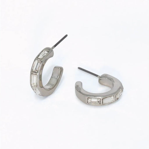 Silver hoop earrings featuring clear crystal accents and a polished elegant design