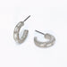 Silver hoop earrings featuring clear crystal accents and a polished elegant design