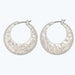 These Periwinkle Hammered Silver Hoop Earring feature a hand-hammered texture that catches light beautifully.
