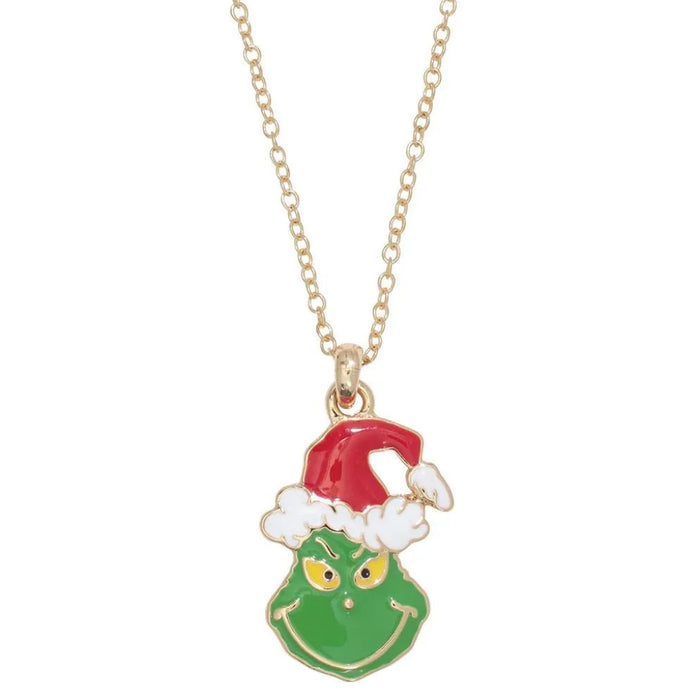 This Periwinkle Grumpy Green Christmas Necklace features a whimsical, grumpy holiday character rendered in vibrant green enamel