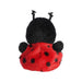 A cute ladybug stuffed animal on a white background, illustrating its friendly appearance and colorful design.