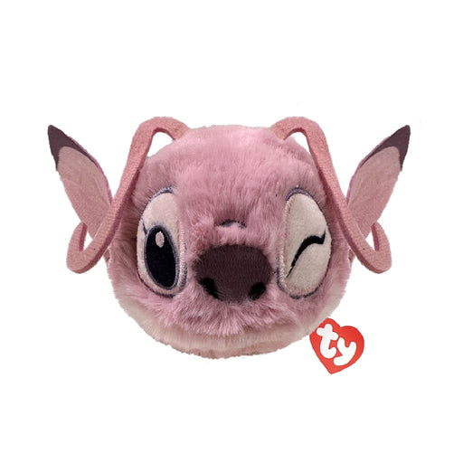 A pink stuffed animal featuring a large nose, sitting upright with a cheerful expression.