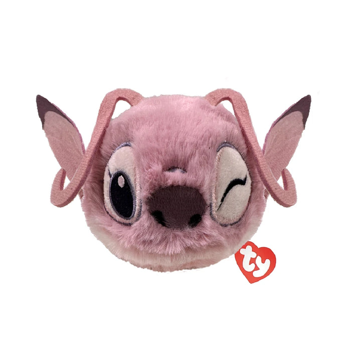 A pink stuffed animal featuring a large nose, sitting upright with a cheerful expression.