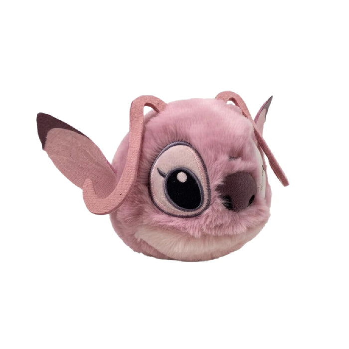 A plush pink toy with an oversized nose, exuding a friendly and playful appearance.