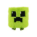 A green Minecraft creeper plushie with a pixelated face, sitting upright on a white background.