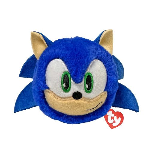Plush Sonic the Hedgehog toy with a tag, displaying vibrant blue and red colors, positioned on a simple backdrop.