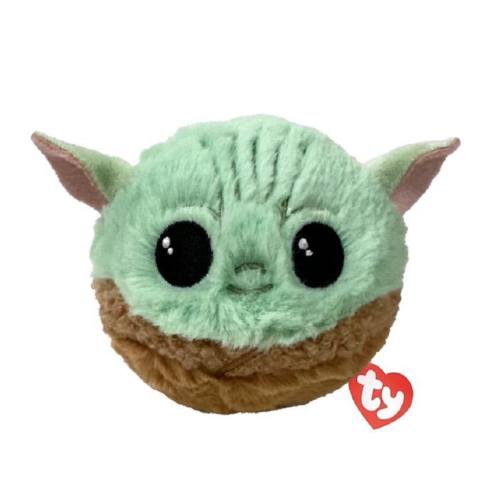 A plush toy of Child Yoda, featuring large ears and a green face, is displayed against a neutral background.