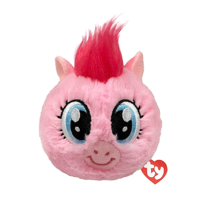 Pink pony plush toy with blue eyes and soft pink hair, sitting upright against a neutral background.