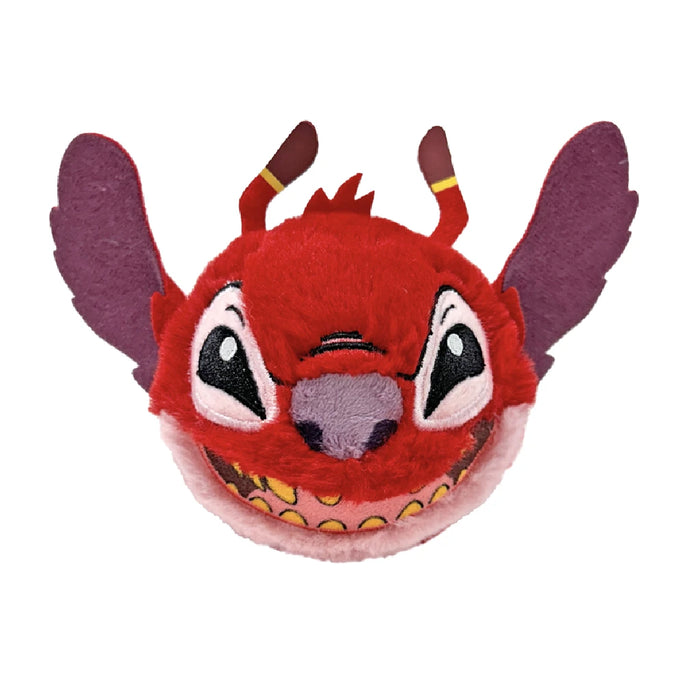 Plush toy of Disney's Stitch, showcasing wings and expressive eyes, designed in bright blue with a cheerful demeanor.